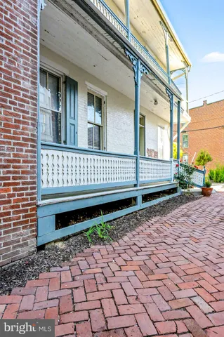 a view of a pathway with a chair