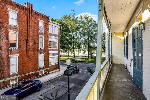 a city street lined with tall buildings
