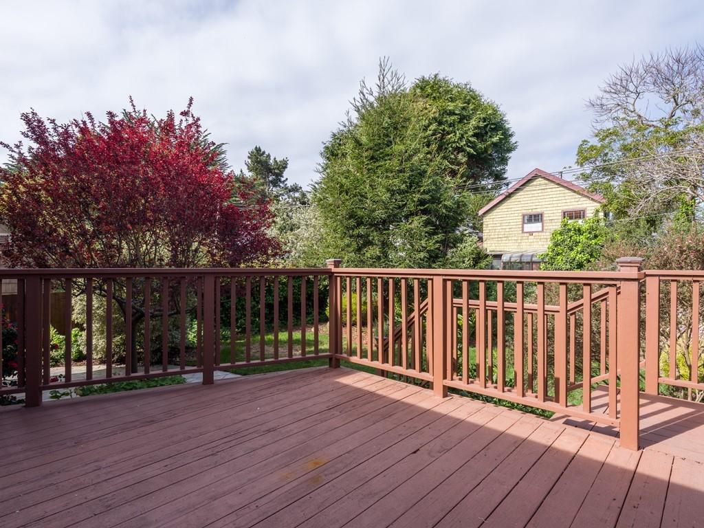 571 Lancaster Boulevard Moss Beach, CA 94038 - Photo 11 of 16 a view of backyard with deck and wooden floor