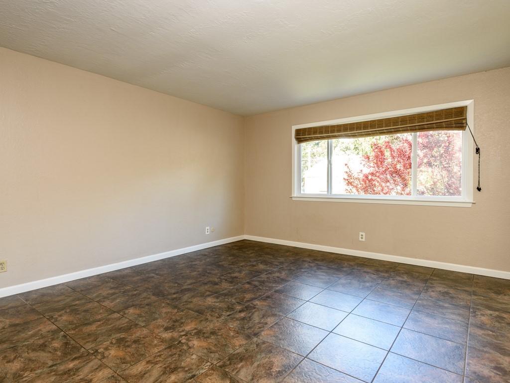 571 Lancaster Boulevard Moss Beach, CA 94038 - Photo 10 of 16 an empty room with window