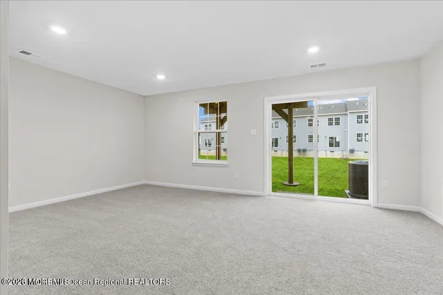 a view of an empty room with window