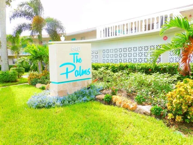 a view of swimming pool with a garden