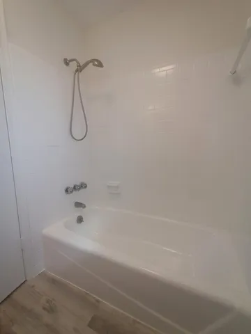 a bathroom with a bathtub