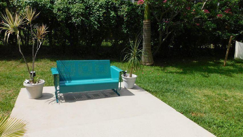 640 Southeast 2nd Avenue, Unit 202 Boynton Beach, FL 33435 - Photo 19 of 21 a green field with trees in the background