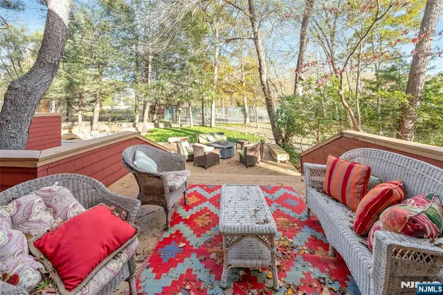 a view of a dinning table and chairs in the patio