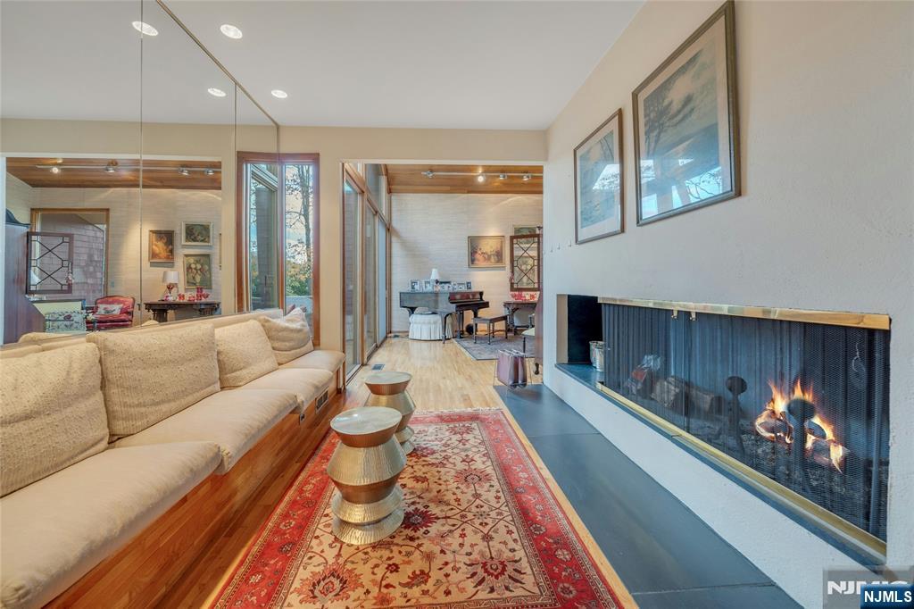 262 West Saddle River Road Upper Saddle River, NJ 07458 - Photo 6 of 24 a living room with furniture and a fireplace