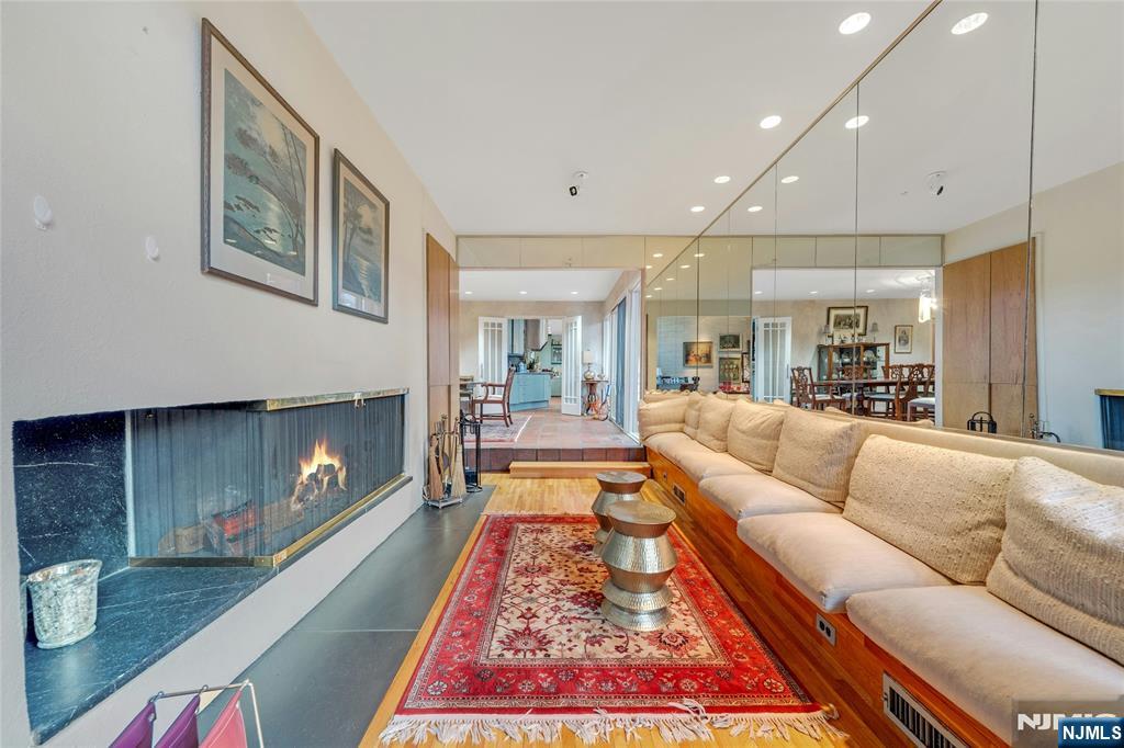262 West Saddle River Road Upper Saddle River, NJ 07458 - Photo 7 of 24 a living room with furniture and a fireplace