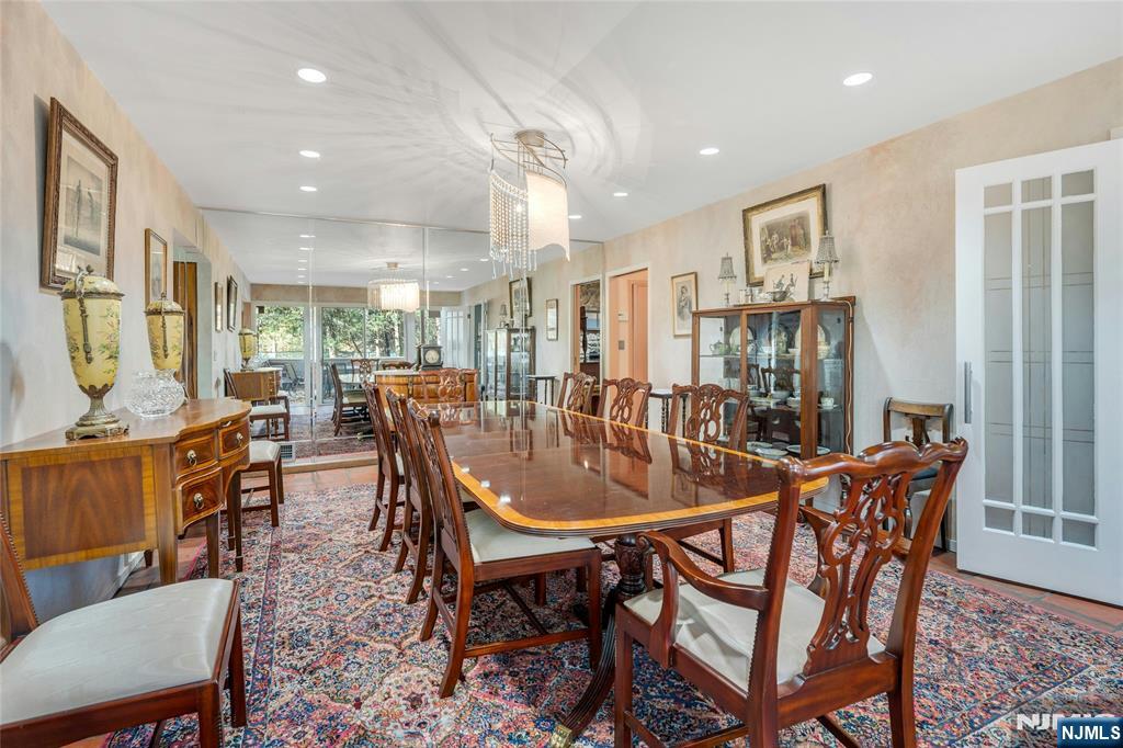 262 West Saddle River Road Upper Saddle River, NJ 07458 - Photo 8 of 24 a view of a dining room with furniture and a livingroom
