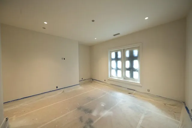 a view of a room that has a window