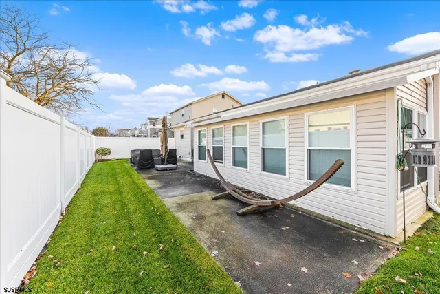 a house view with a garden space