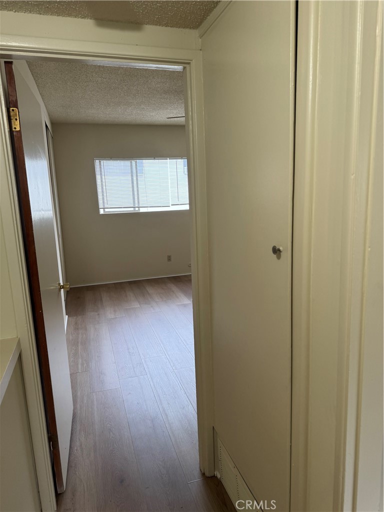 936 West Duarte Road, Unit C Arcadia, CA 91007 - Photo 14 of 29 a view of room with window and wooden floor