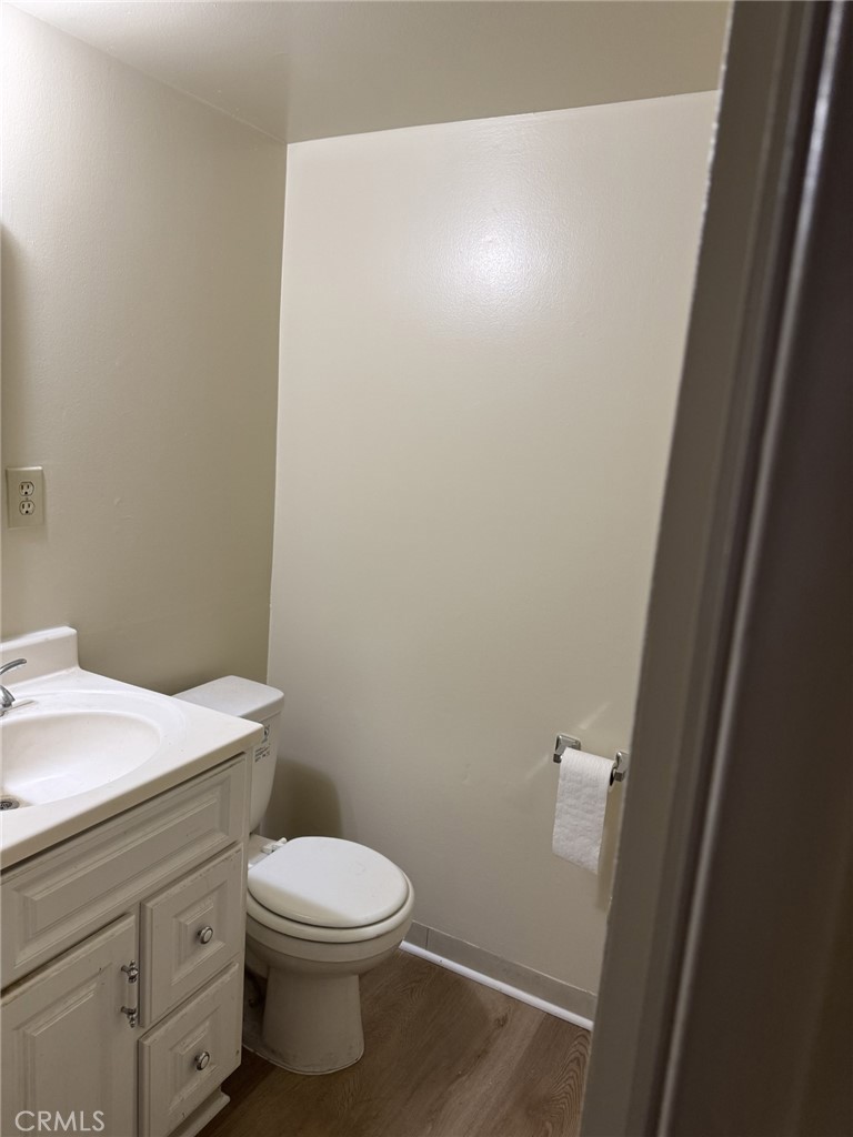 936 West Duarte Road, Unit C Arcadia, CA 91007 - Photo 28 of 29 a bathroom with a toilet a sink and a vanity