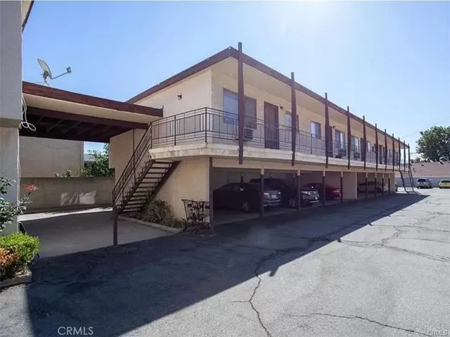 a view of a building with a street