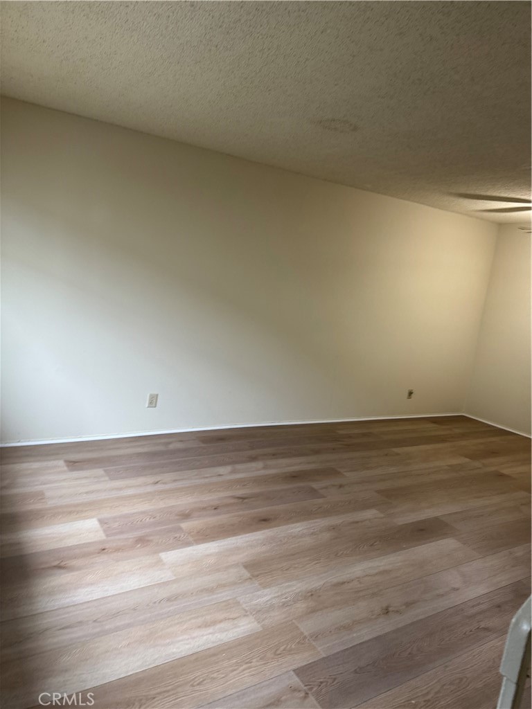 936 West Duarte Road, Unit C Arcadia, CA 91007 - Photo 7 of 29 a view of an empty room and wooden floor