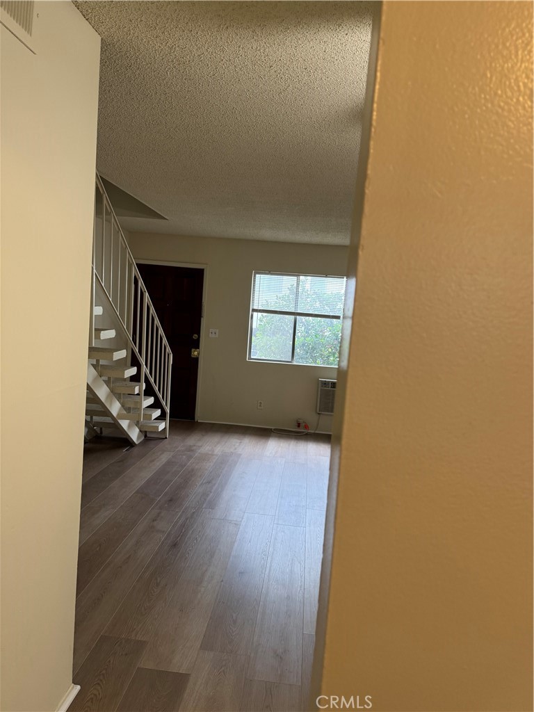 936 West Duarte Road, Unit C Arcadia, CA 91007 - Photo 9 of 29 a view of a livingroom with wooden floor and a window