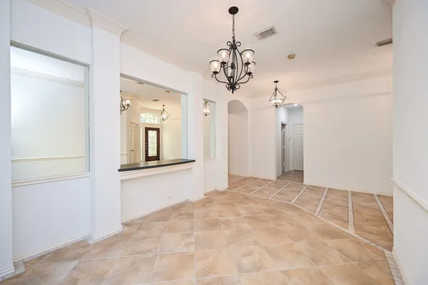 a living room with furniture fireplace and flat screen tv