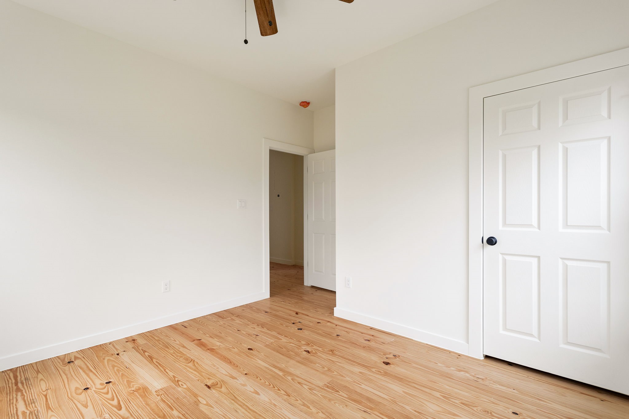 226 North Dixie Street Brenham, TX 77833 - Photo 18 of 22 a view of empty room with wooden floor
