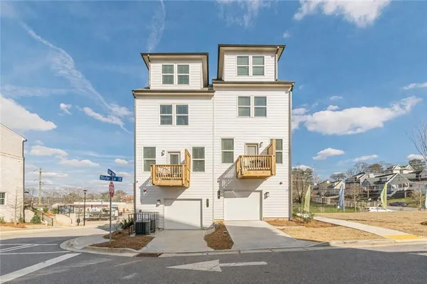 a view of a building with a street