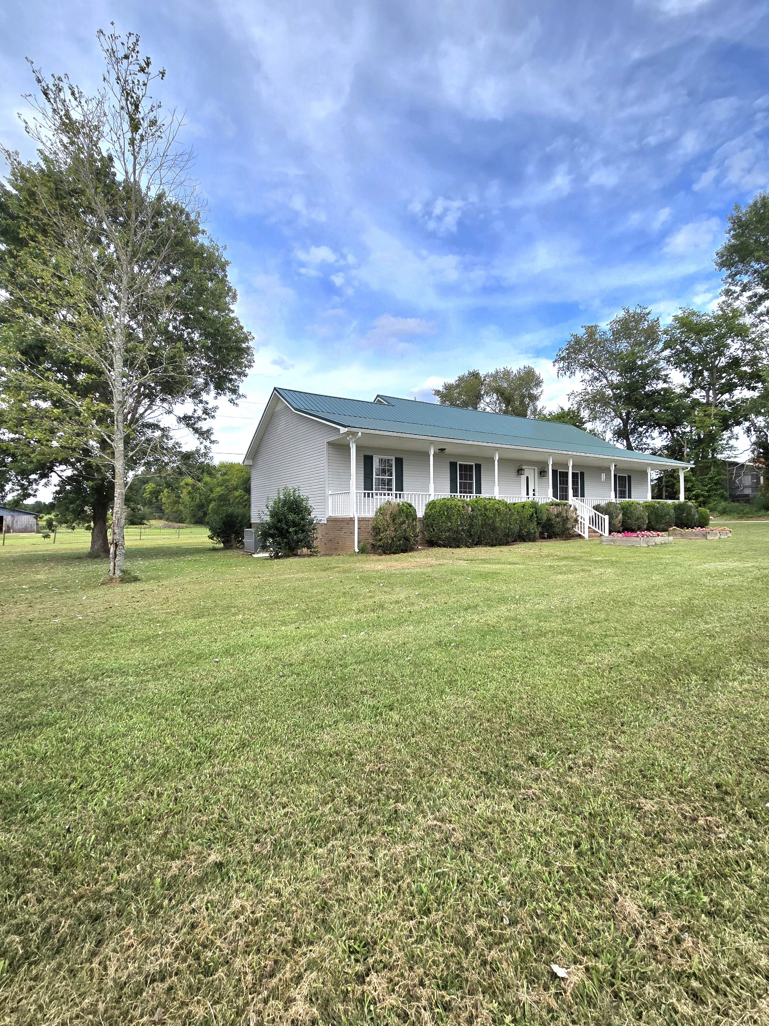 1960 Port Royal Road Adams, TN 37010 - Photo 1 of 32 a view of house with yard and outdoor seating
