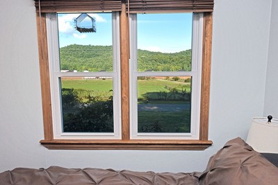 87 Snowbird Road Robbinsville, NC 28771 - Photo 23 of 40 a view of a room that has a bed and a window