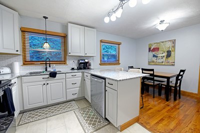 87 Snowbird Road Robbinsville, NC 28771 - Photo 26 of 40 a kitchen with sink cabinets and window