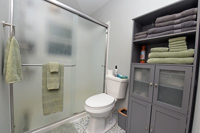 87 Snowbird Road Robbinsville, NC 28771 - Photo 30 of 40 a bathroom with a toilet and a shower