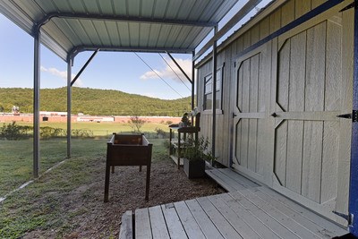 87 Snowbird Road Robbinsville, NC 28771 - Photo 35 of 40 a view of a balcony with furniture
