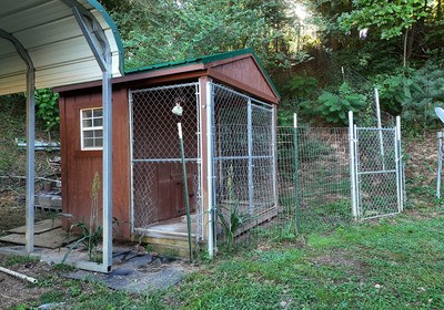 87 Snowbird Road Robbinsville, NC 28771 - Photo 37 of 40 a front view of a house with garden