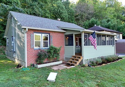 87 Snowbird Road Robbinsville, NC 28771 - Photo 38 of 40 a front view of a house with a yard