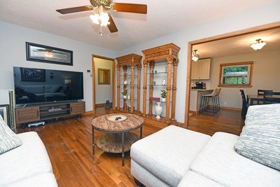 87 Snowbird Road Robbinsville, NC 28771 - Photo 9 of 40 a living room with furniture and a flat screen tv