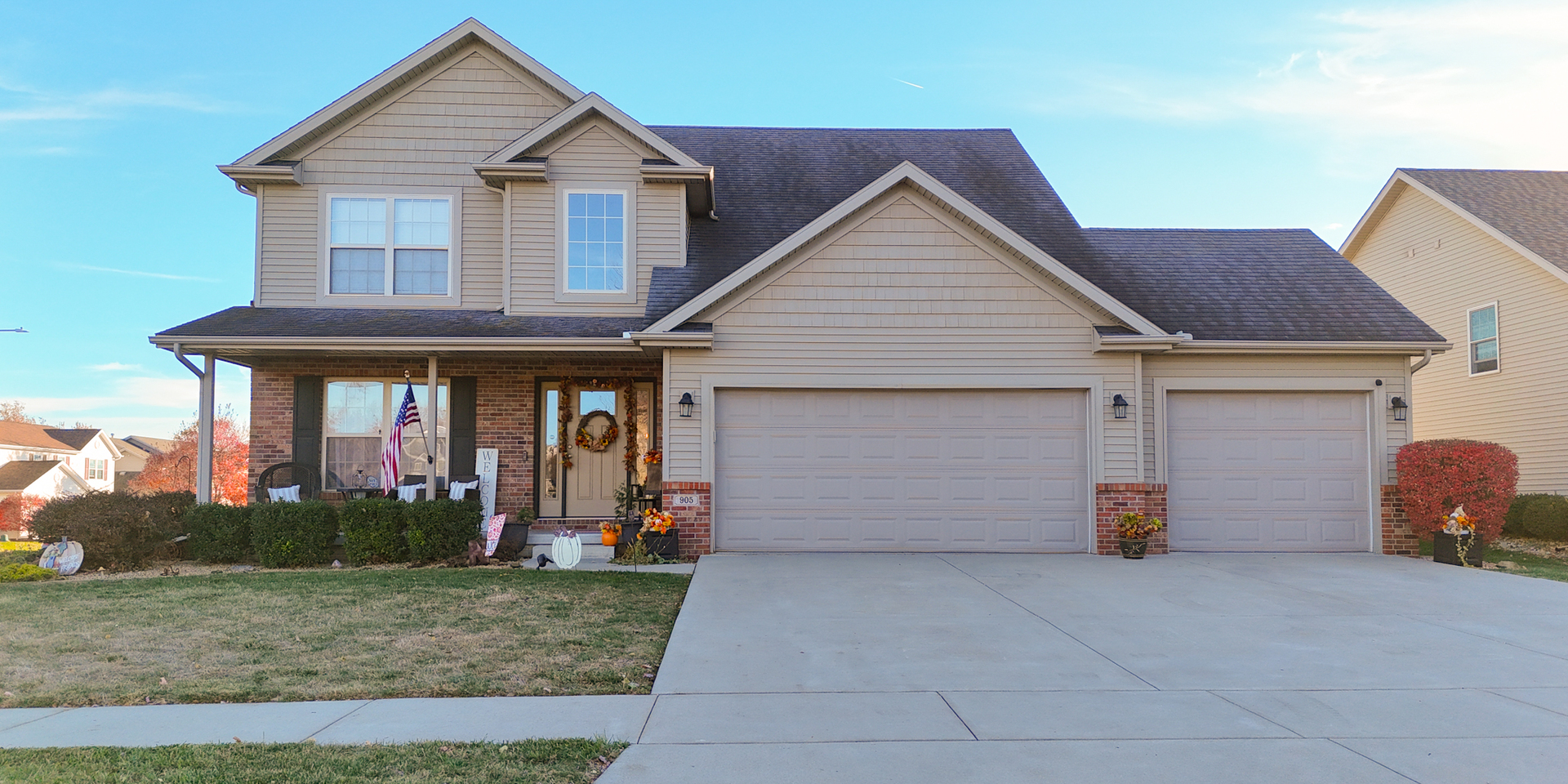 905 Dresser Drive Normal, IL 61761 - Photo 1 of 38 a front view of a house with a yard and garage