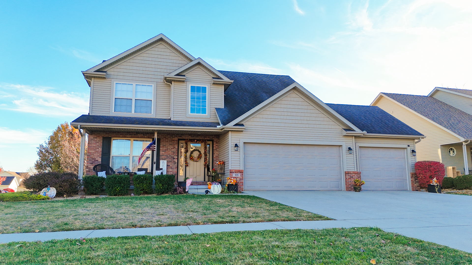 905 Dresser Drive Normal, IL 61761 - Photo 2 of 38 a house view with a garden space