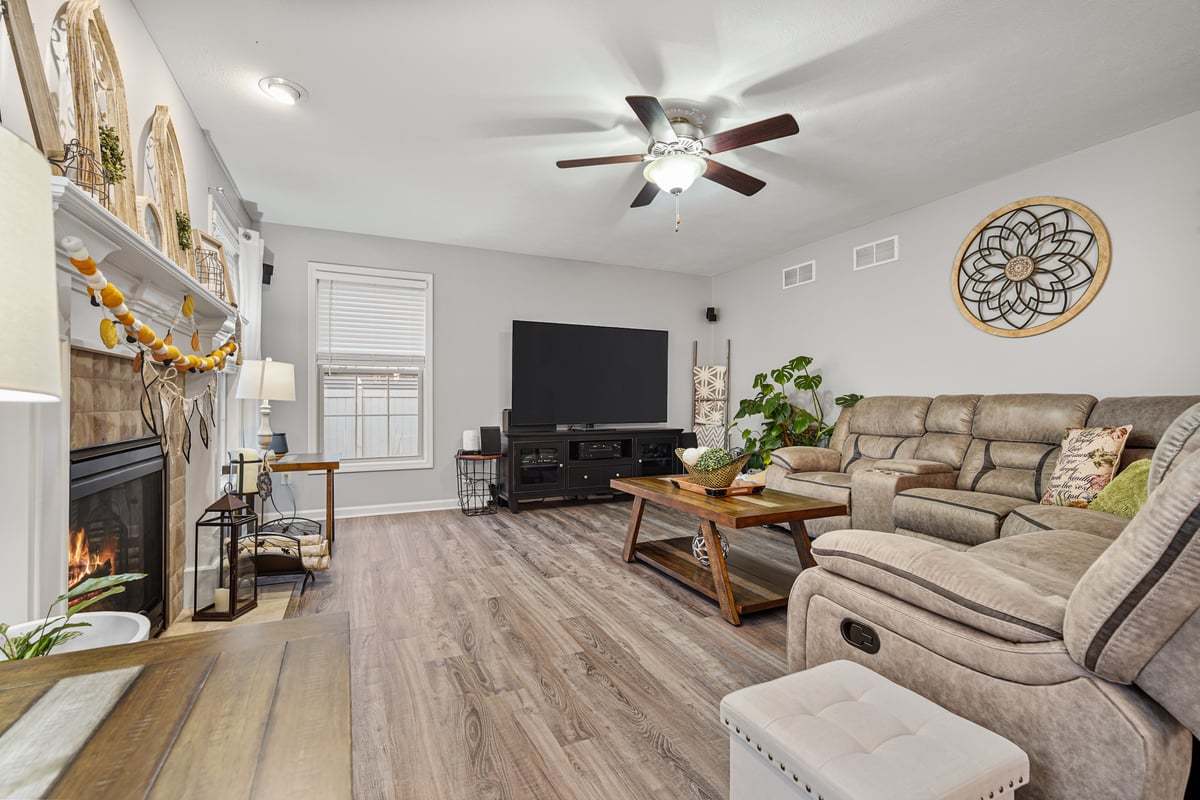 905 Dresser Drive Normal, IL 61761 - Photo 22 of 38 a living room with furniture and a flat screen tv