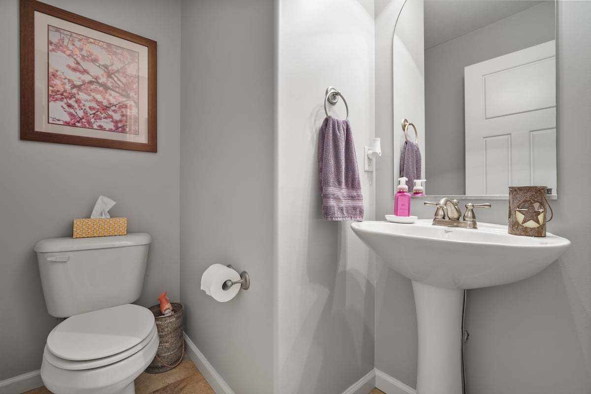 905 Dresser Drive Normal, IL 61761 - Photo 26 of 38 a bathroom with a toilet sink and mirror