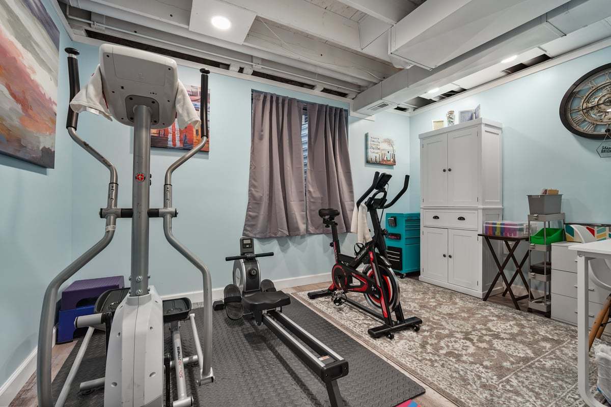 905 Dresser Drive Normal, IL 61761 - Photo 30 of 38 a view of gym equipment with wooden walls