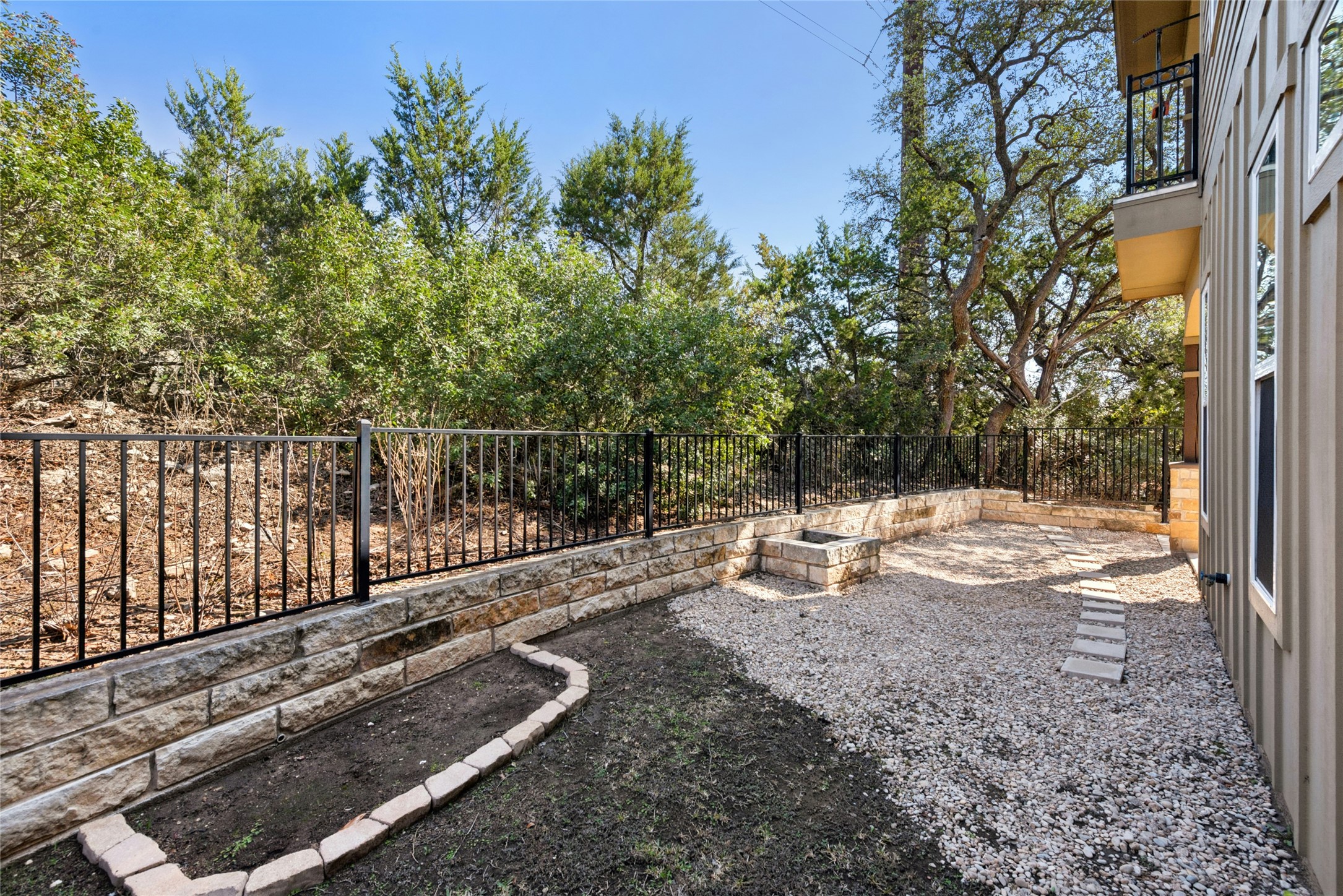 4301 Mansfield Dam Road, Unit 2101 Austin, TX 78734 - Photo 17 of 17 Fenced backyard with a patio area
