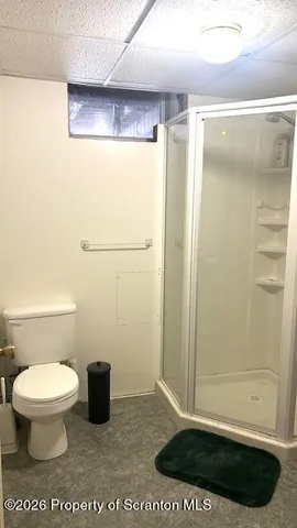 a bathroom with a toilet