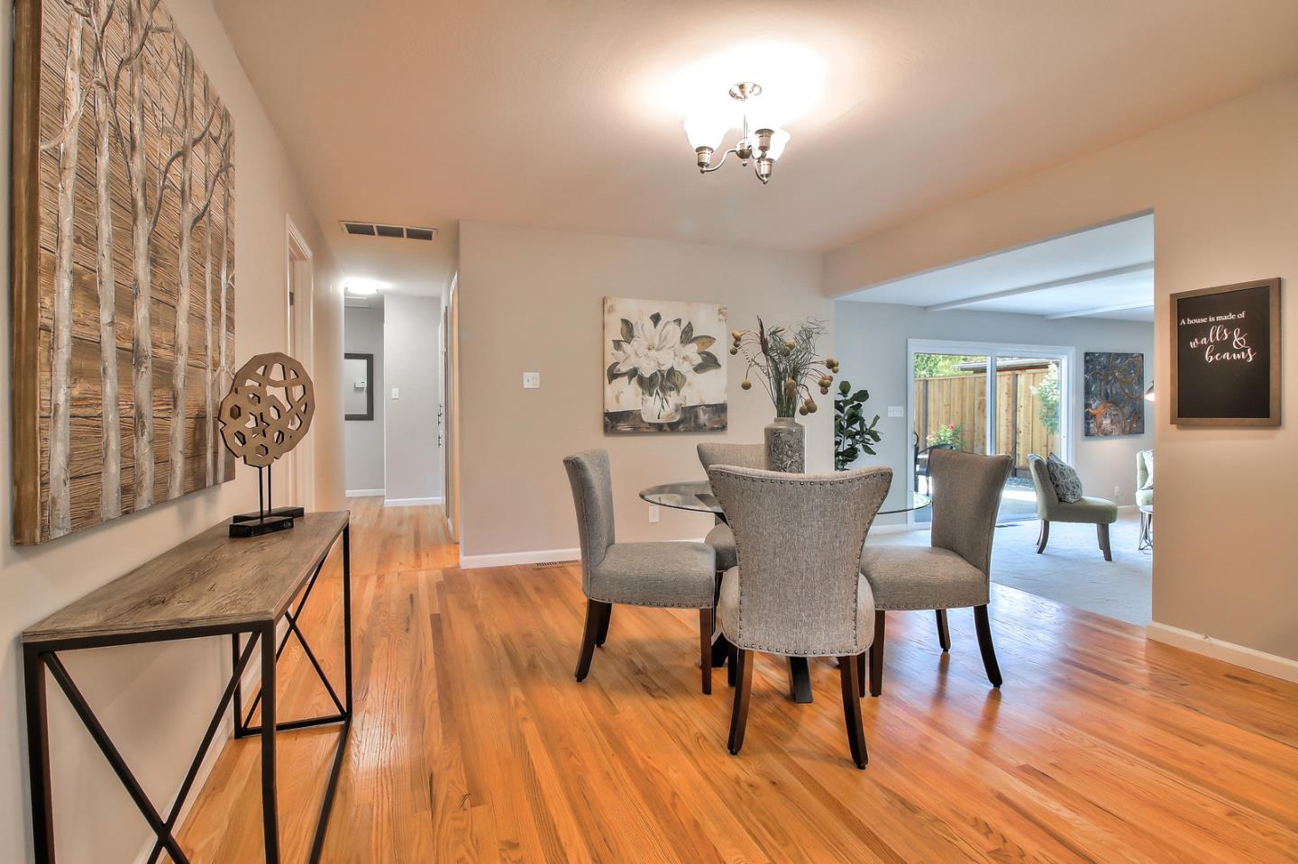 2128 Vía D'Este Campbell, CA 95008 - Photo 13 of 33 a view of a dining room with furniture and wooden floor