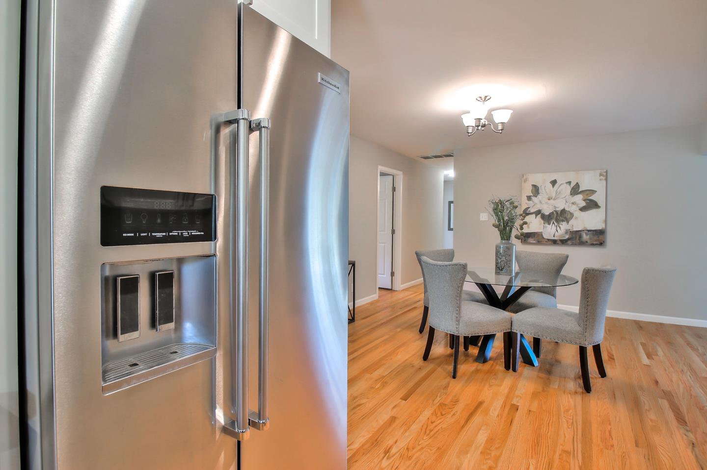 2128 Vía D'Este Campbell, CA 95008 - Photo 20 of 33 a view of a dining room with furniture and wooden floor