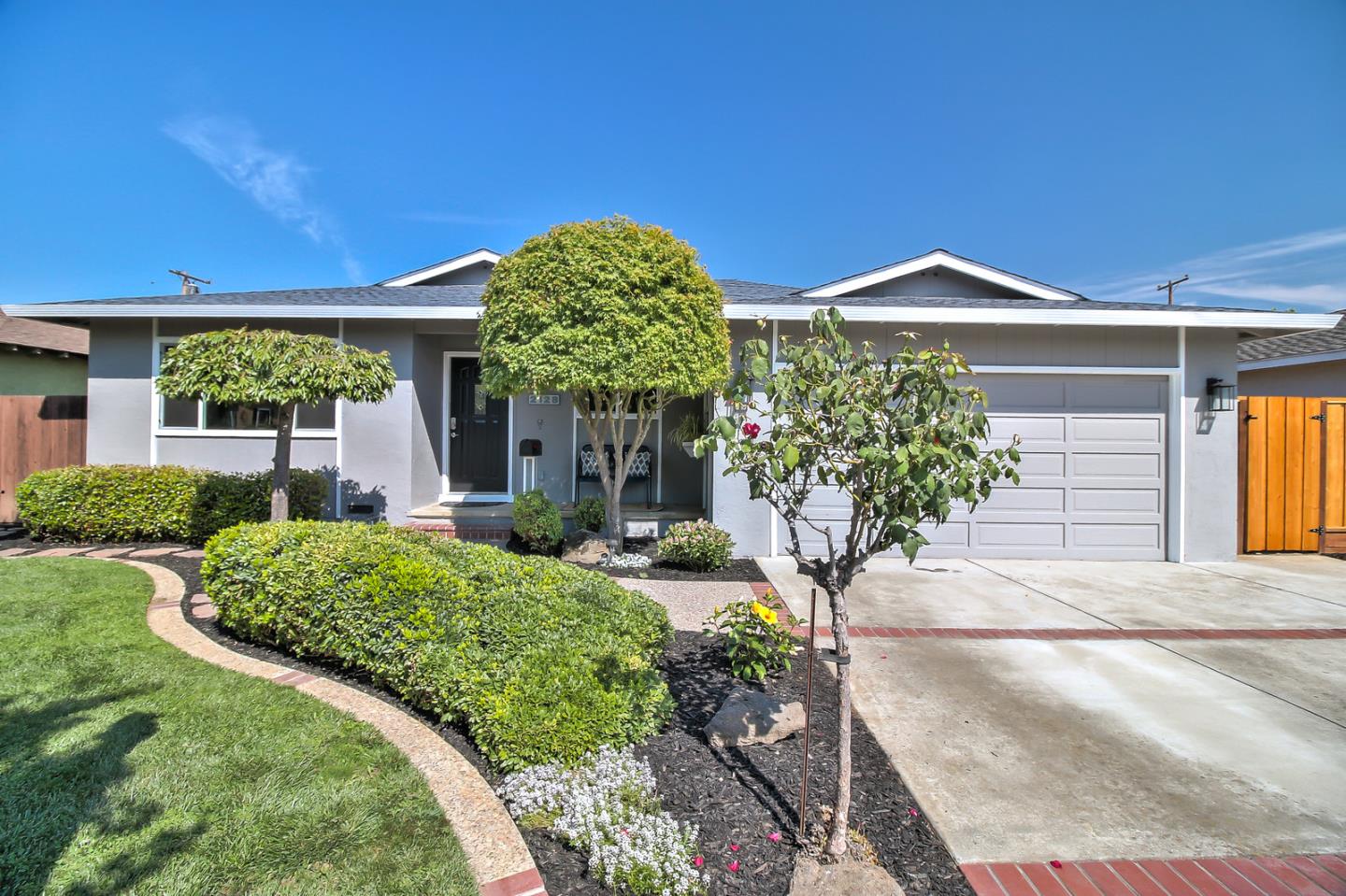 2128 Vía D'Este Campbell, CA 95008 - Photo 2 of 33 a view of a house with fountain and potted plants