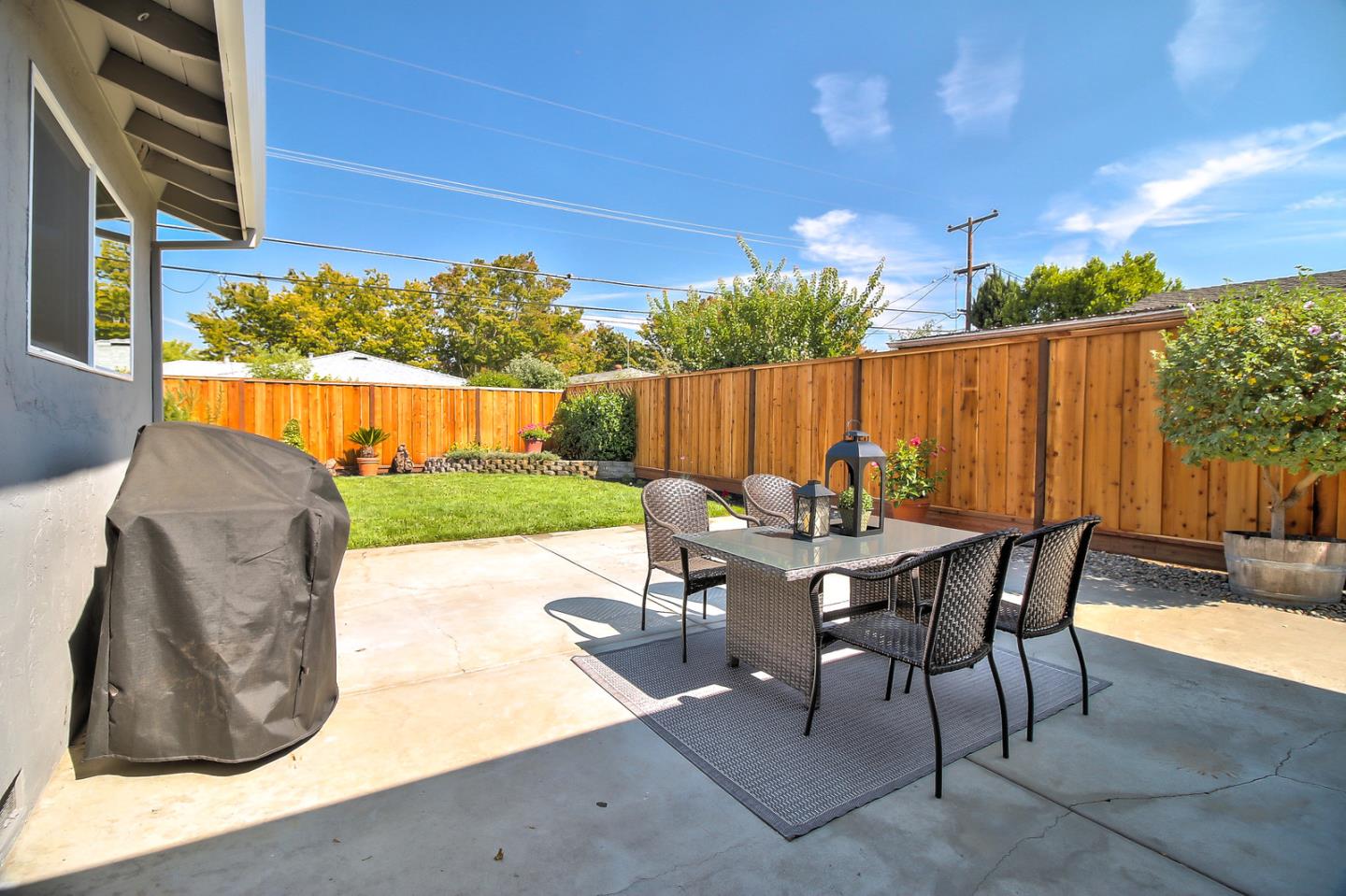 2128 Vía D'Este Campbell, CA 95008 - Photo 28 of 33 a view of backyard with outdoor seating a patio and plants