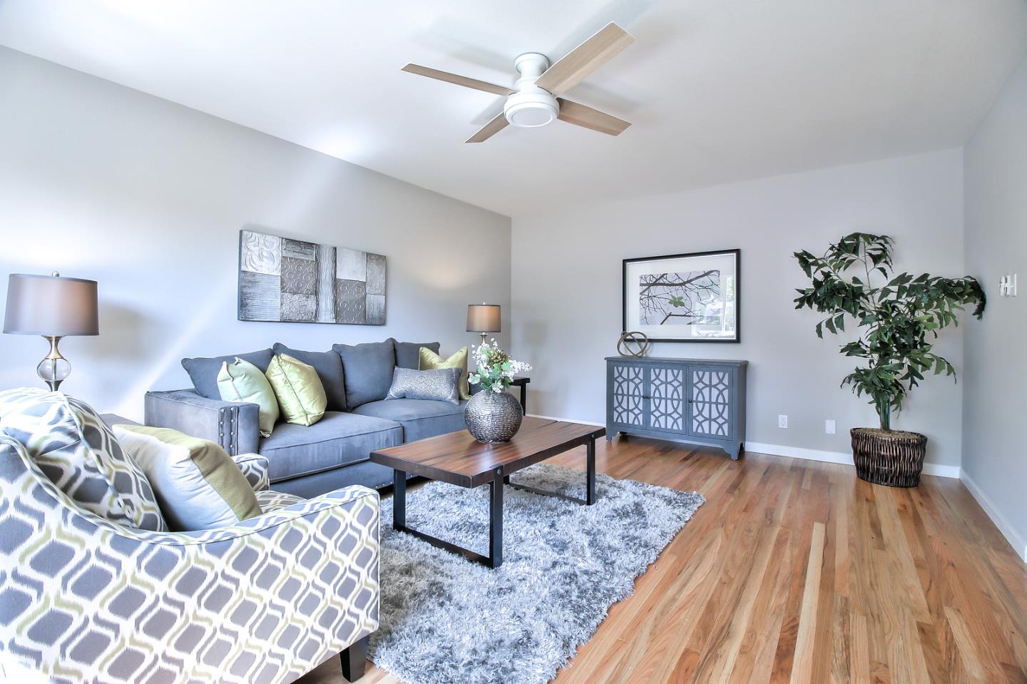 2128 Vía D'Este Campbell, CA 95008 - Photo 5 of 33 a living room with furniture and a potted plant