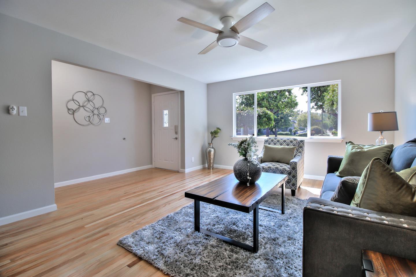 2128 Vía D'Este Campbell, CA 95008 - Photo 6 of 33 a living room with furniture and a window