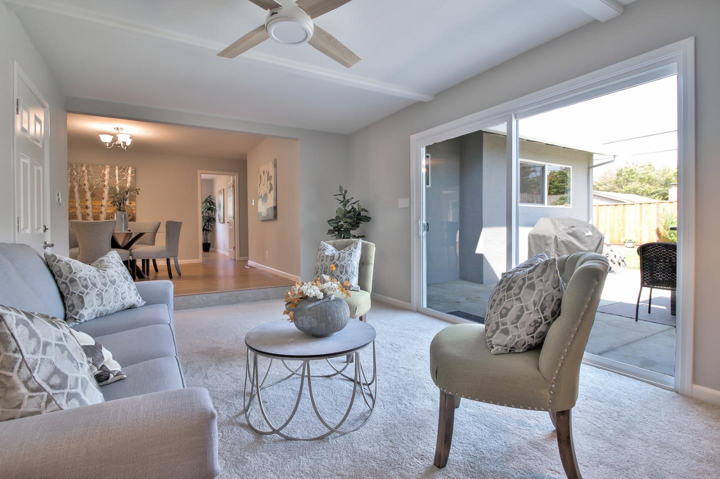 2128 Vía D'Este Campbell, CA 95008 - Photo 10 of 33 a living room with furniture and a large window