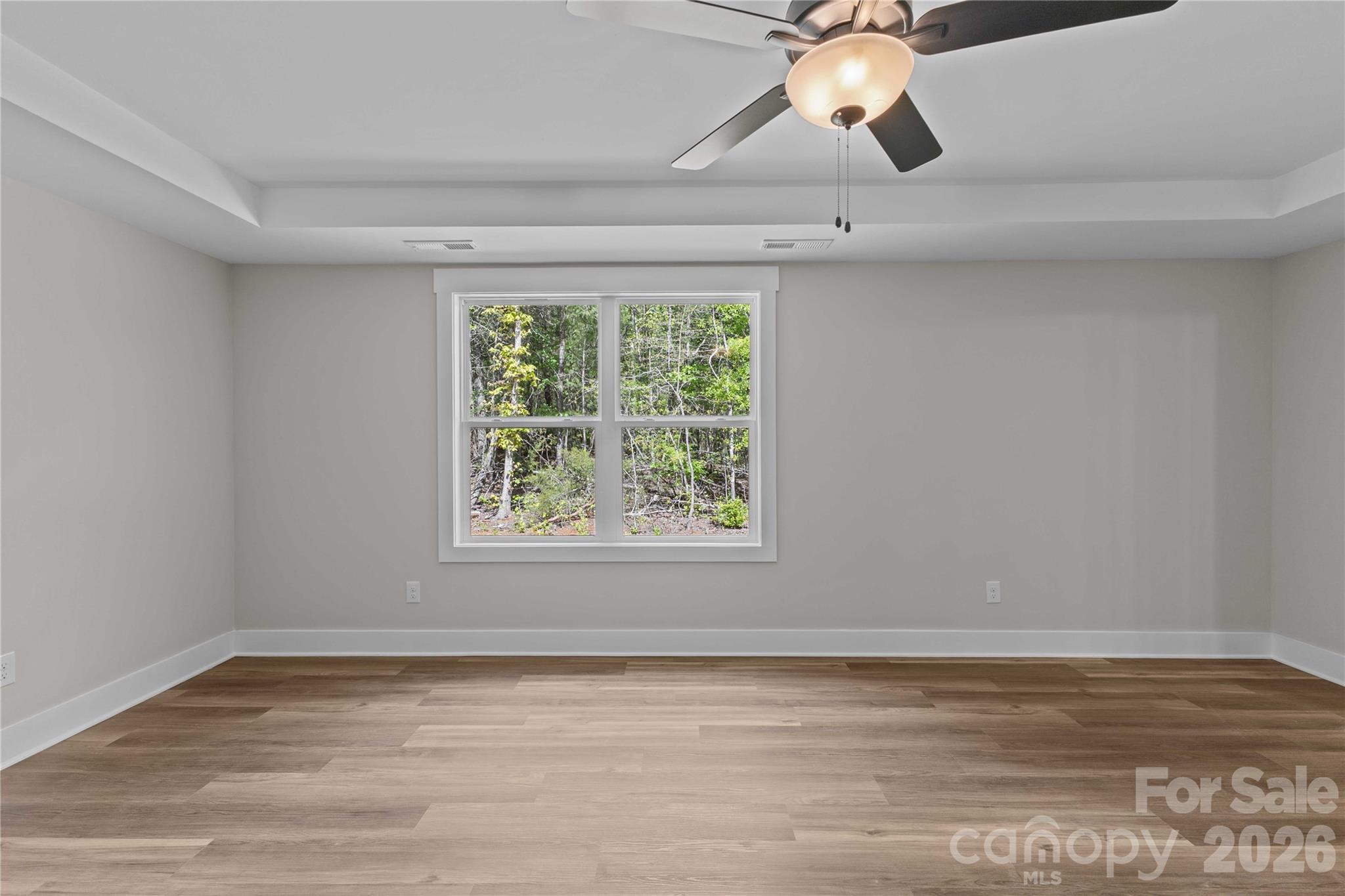 4581 Riverside Road Lancaster, SC 29720 - Photo 26 of 46 a view of a room with a window and a ceiling fan
