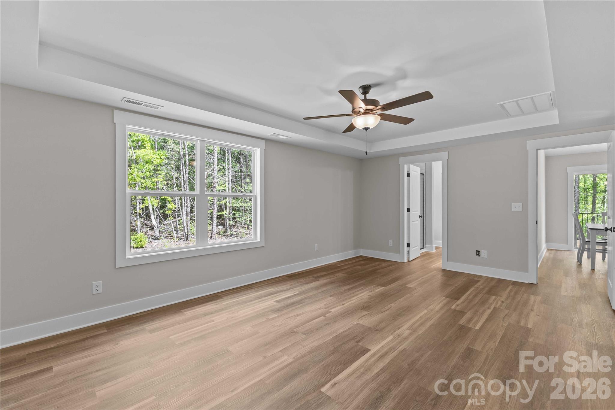 4581 Riverside Road Lancaster, SC 29720 - Photo 27 of 46 a view of an empty room with wooden floor and a window