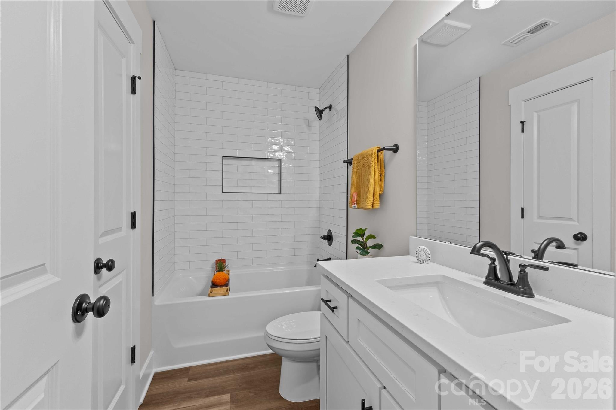 4581 Riverside Road Lancaster, SC 29720 - Photo 33 of 46 a bathroom with a granite countertop sink mirror vanity and toilet