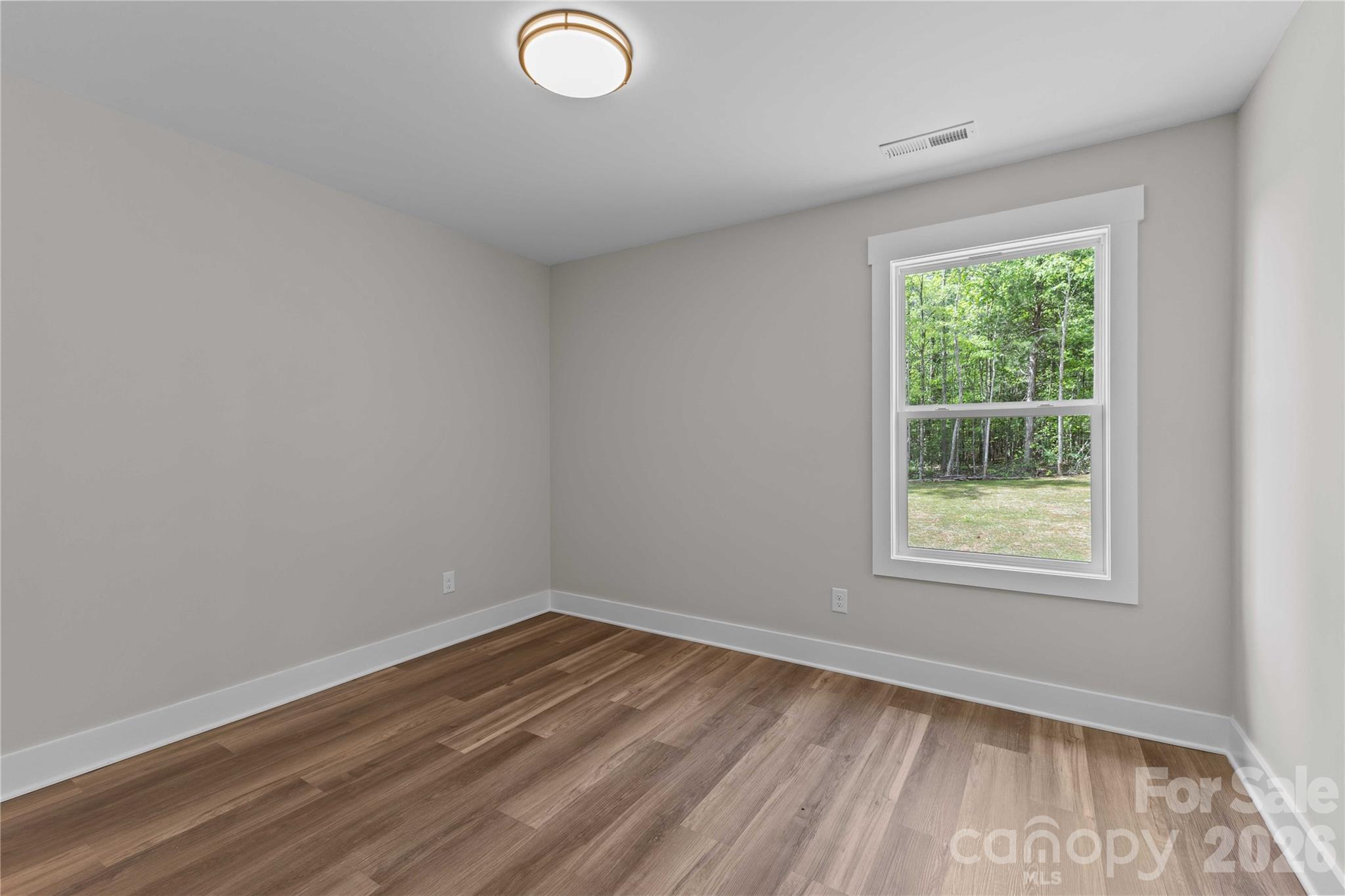 4581 Riverside Road Lancaster, SC 29720 - Photo 36 of 46 an empty room with a window