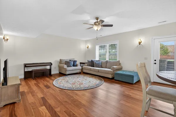 a view of room with furniture and mirror
