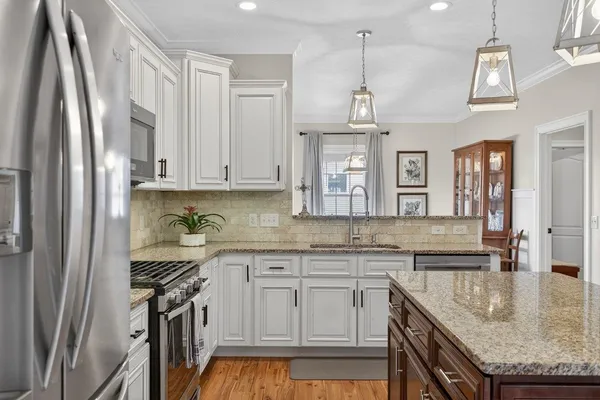 a living room with furniture fireplace and a flat screen tv